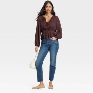 Long sleeved tie front peplum blouse